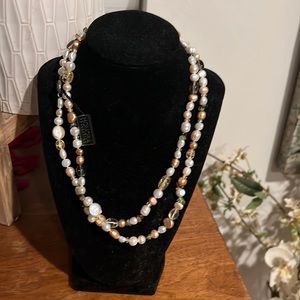 Honora pearl necklace with cream, gold, and green assorted shells and beads.